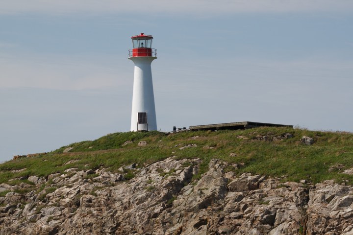 a tower that has a rocky hill